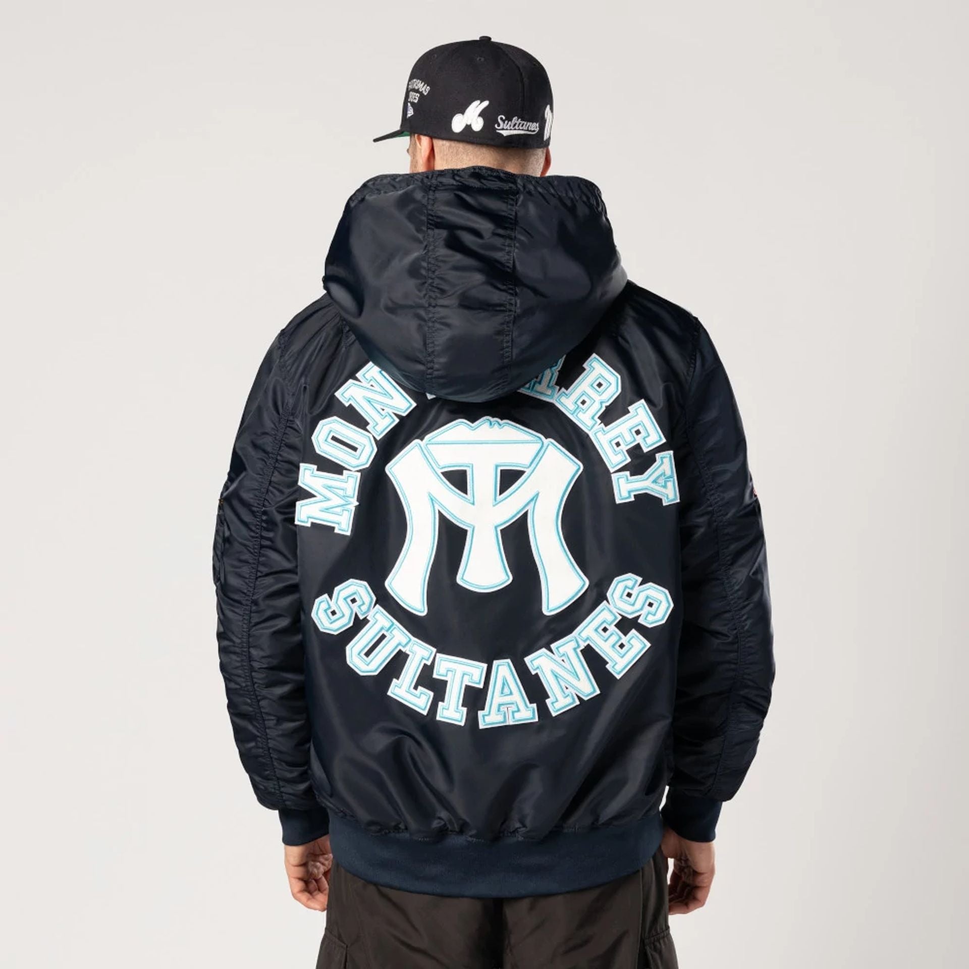 The Male model is wearing Sultanes De Monterrey LMB X Alpha Navy Jacket 2