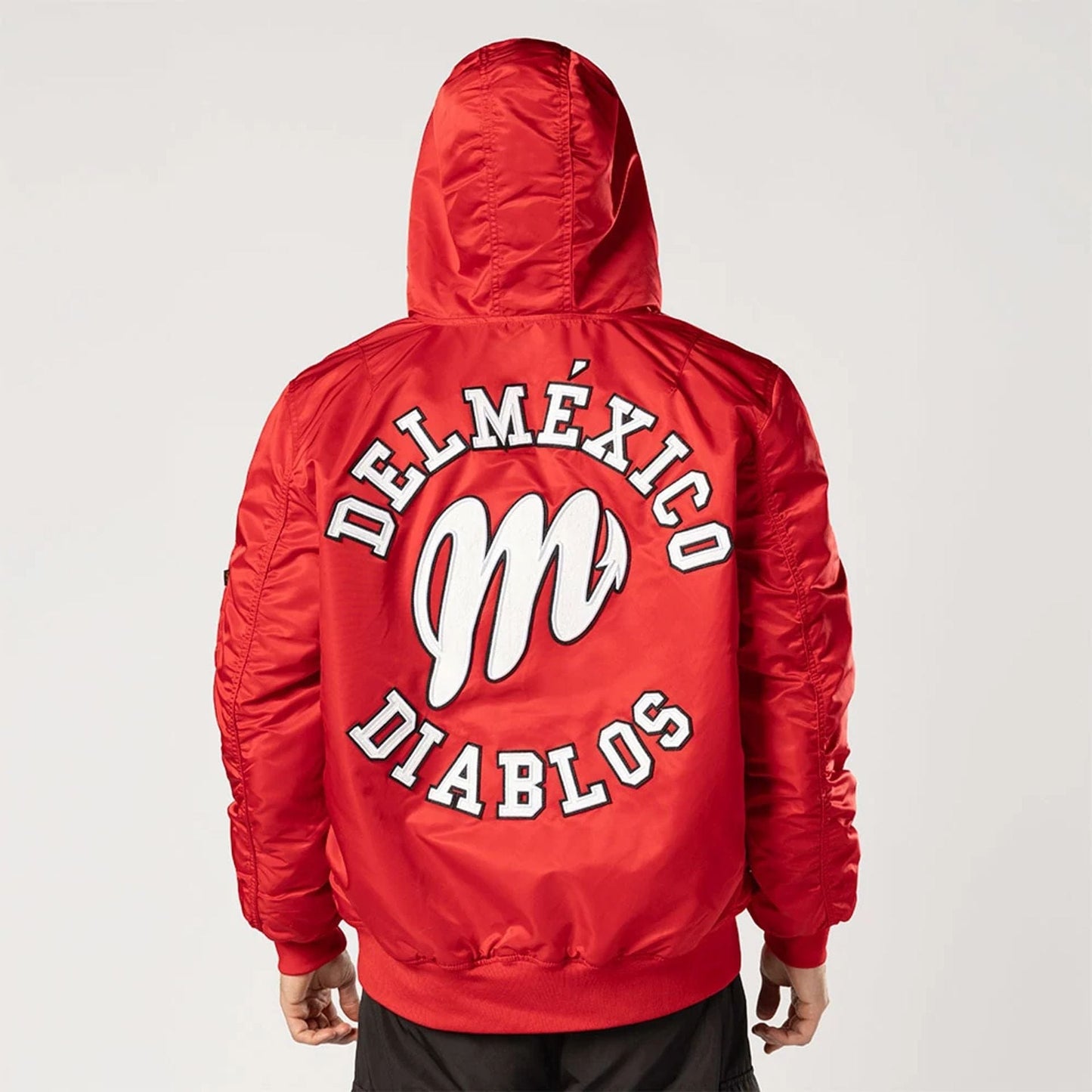 The Male model is wearing Mexico Diablos LMB X Alpha Red Jacket 6