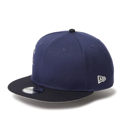 This is a New Era Dripping Emblem Navy 9FIFTY Snapback Adjustable Cap 3