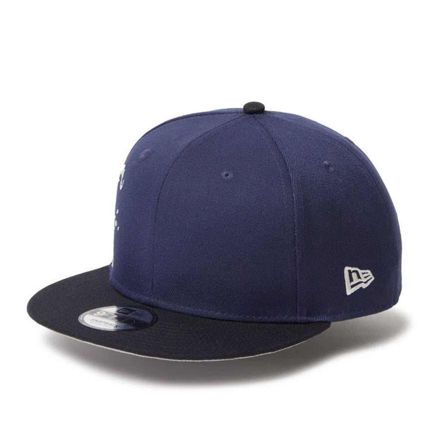 This is a New Era Dripping Emblem Navy 9FIFTY Snapback Adjustable Cap 3
