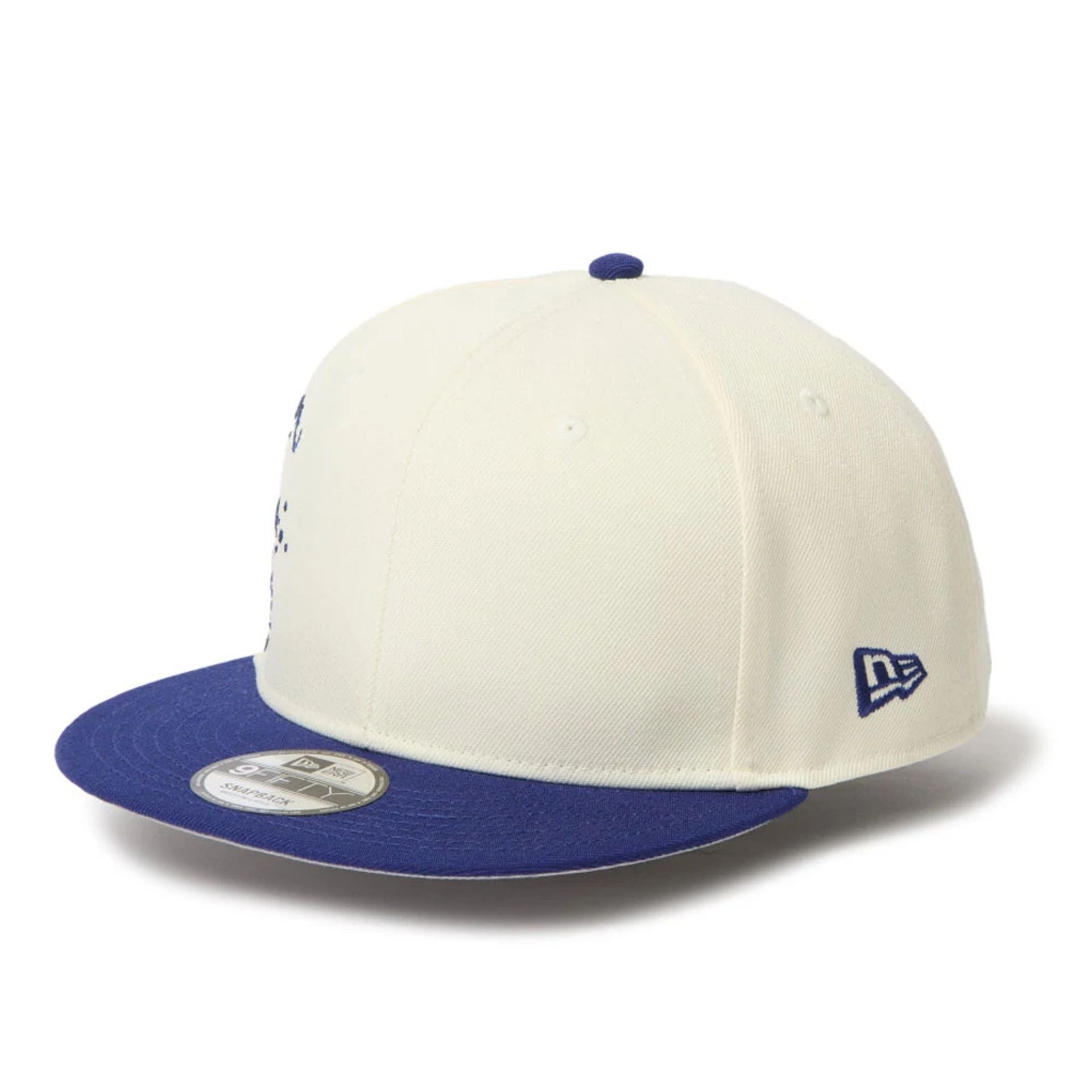 New Era Dripping Emblem Cream 9FIFTY Snapback Cap | NEC UK