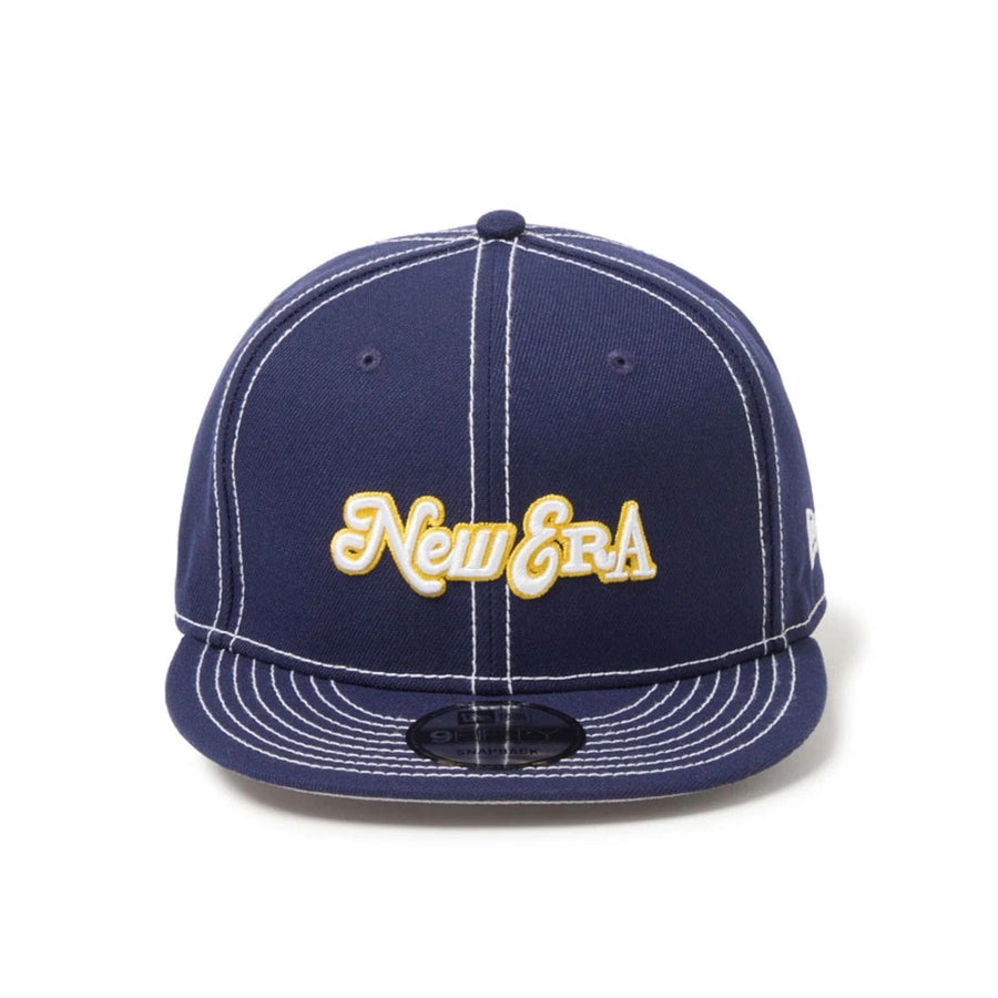 This is a New Era Archive Mix Logo Navy 9FIFTY Snapback Adjustable Cap 2