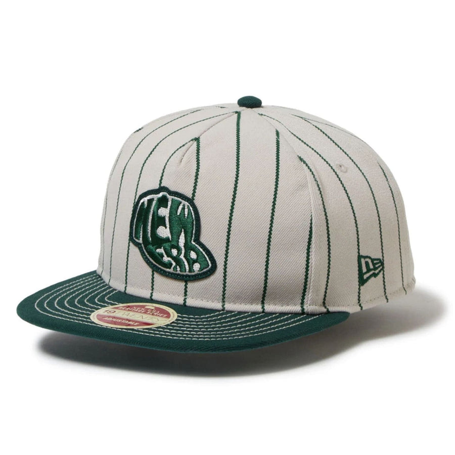 This is a New Era Heritage Stripe Dark Green 19TWENTY Adjustable Cap 1