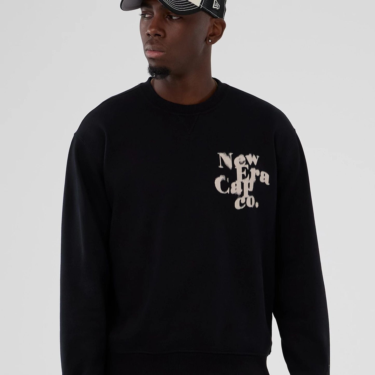 The Male model is wearing New Era Cap Company Black Crew Neck Sweater 7