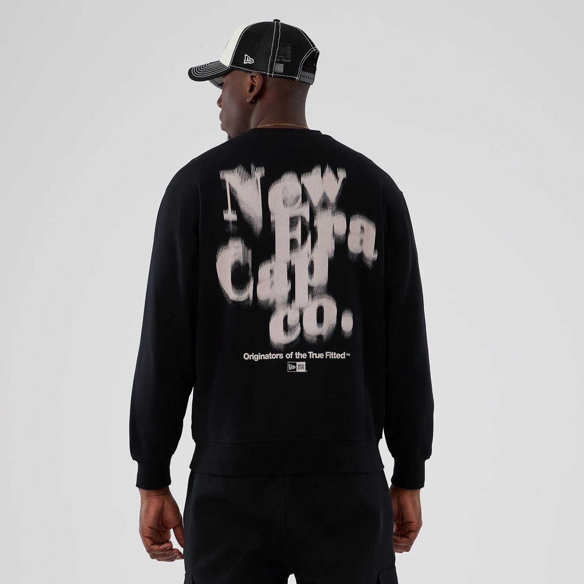 The Male model is wearing New Era Cap Company Black Crew Neck Sweater 2