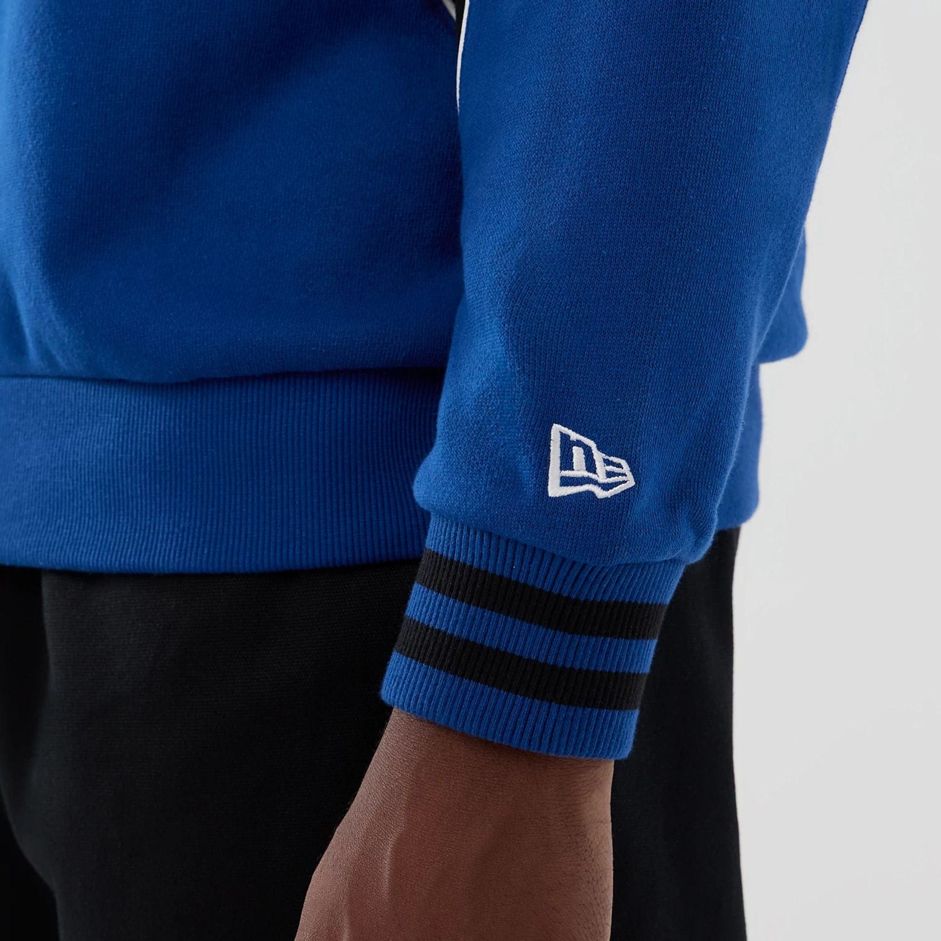 The Male model is wearing New Era Colour Block Navy Crew Neck Sweater 4