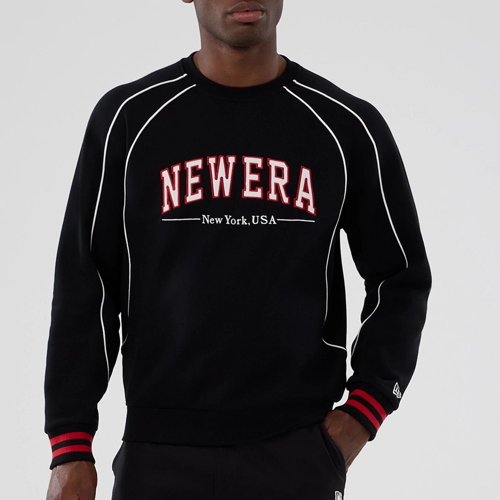 The Male model is wearing New Era Colour Block Black Crew Neck Sweater 7