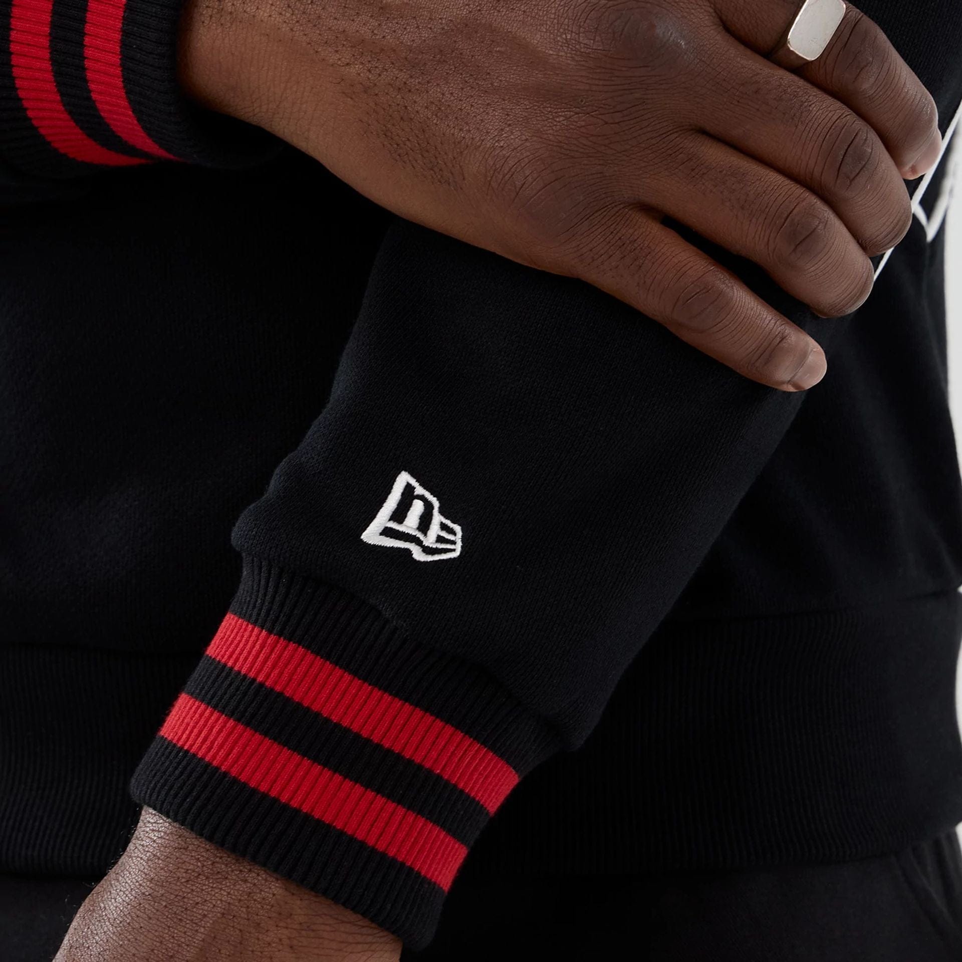 The Male model is wearing New Era Colour Block Black Crew Neck Sweater 4