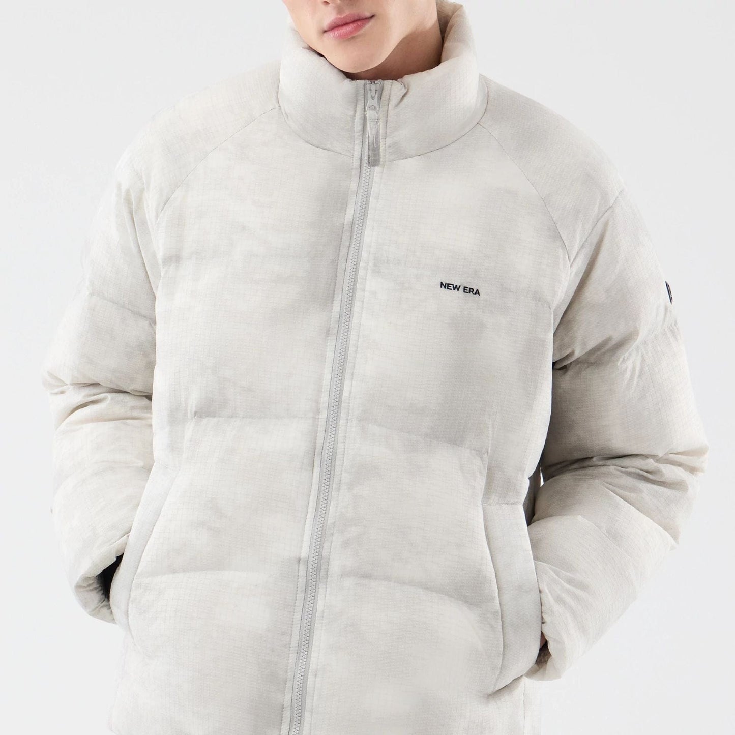 The Male model is wearing  New Era Outdoor Natural Down Jacket  6