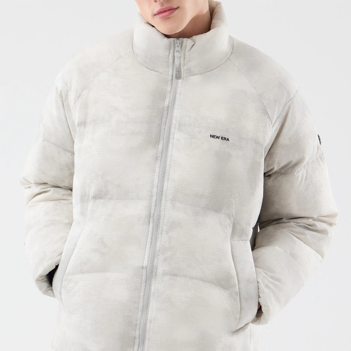 The Male model is wearing  New Era Outdoor Natural Down Jacket 6