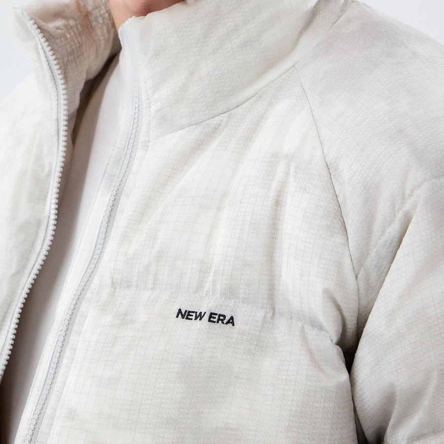 The Male model is wearing  New Era Outdoor Natural Down Jacket  7