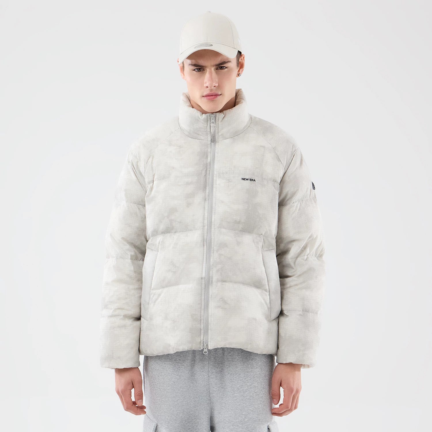 The Male model is wearing  New Era Outdoor Natural Down Jacket 1