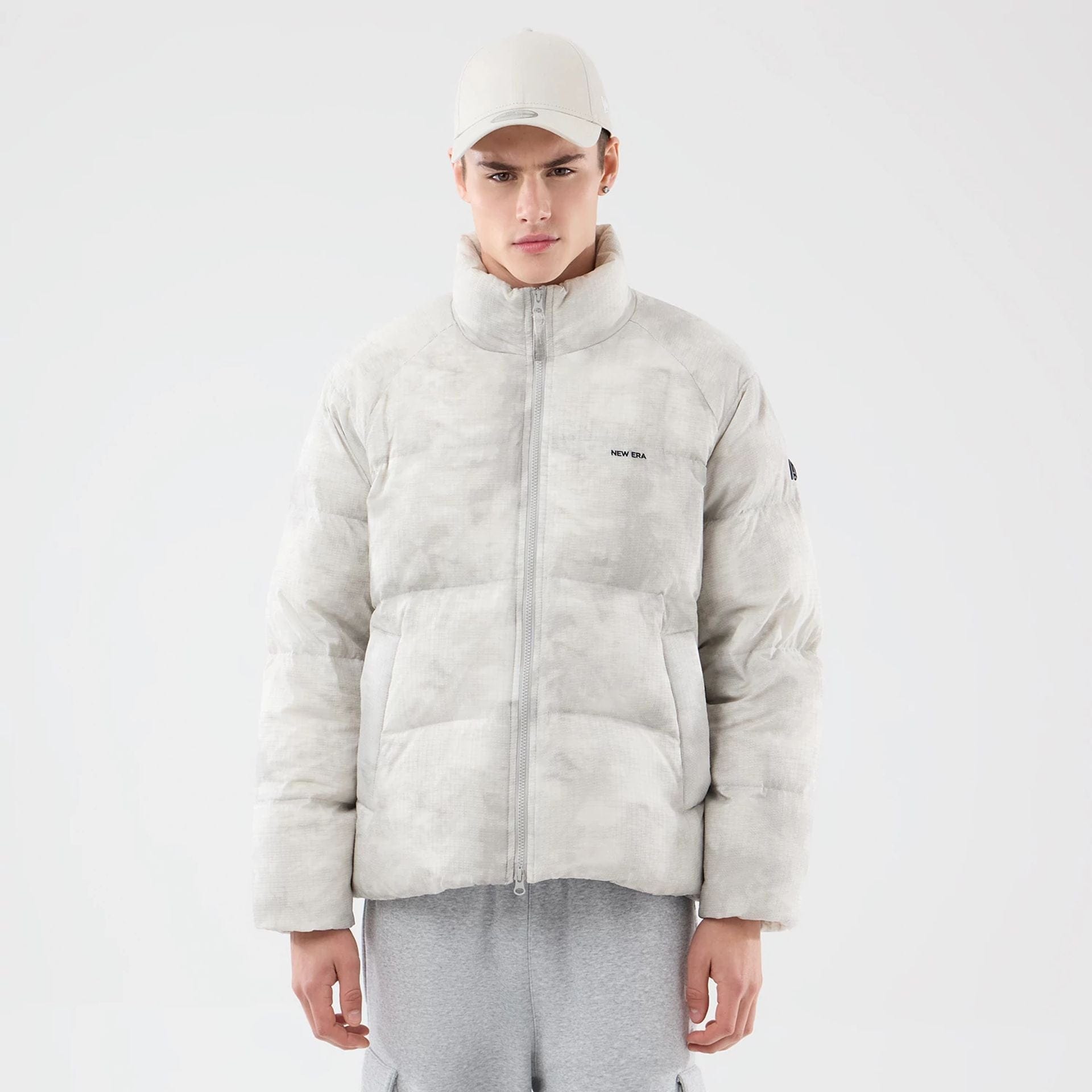 The Male model is wearing  New Era Outdoor Natural Down Jacket  1