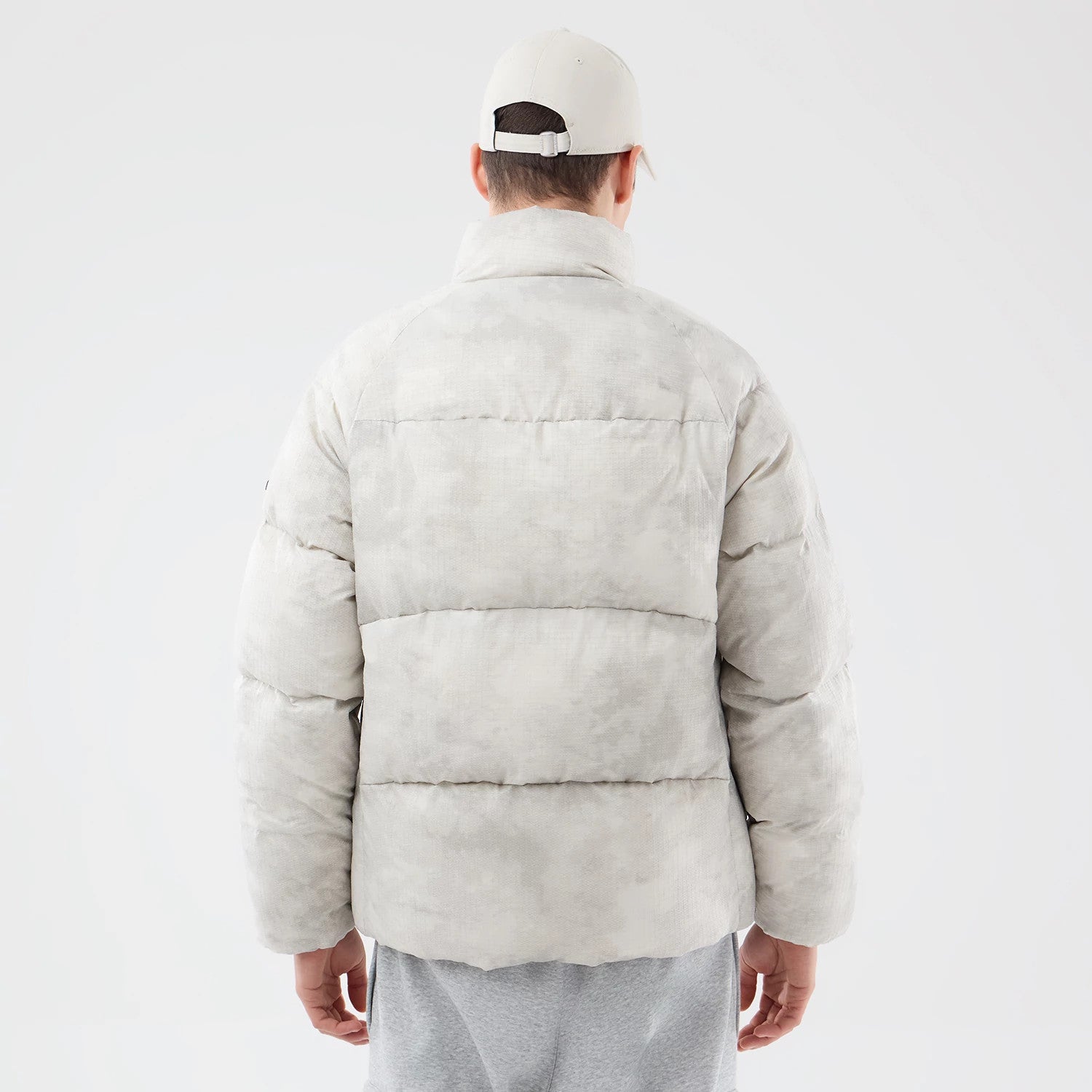 The Male model is wearing  New Era Outdoor Natural Down Jacket 2
