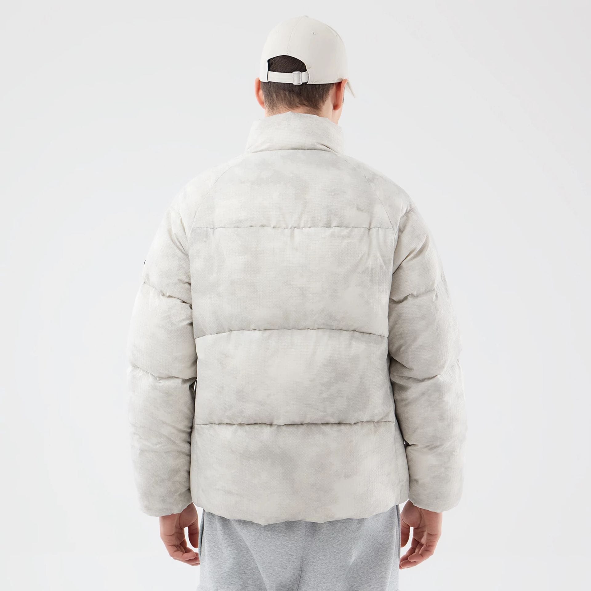 The Male model is wearing  New Era Outdoor Natural Down Jacket 2