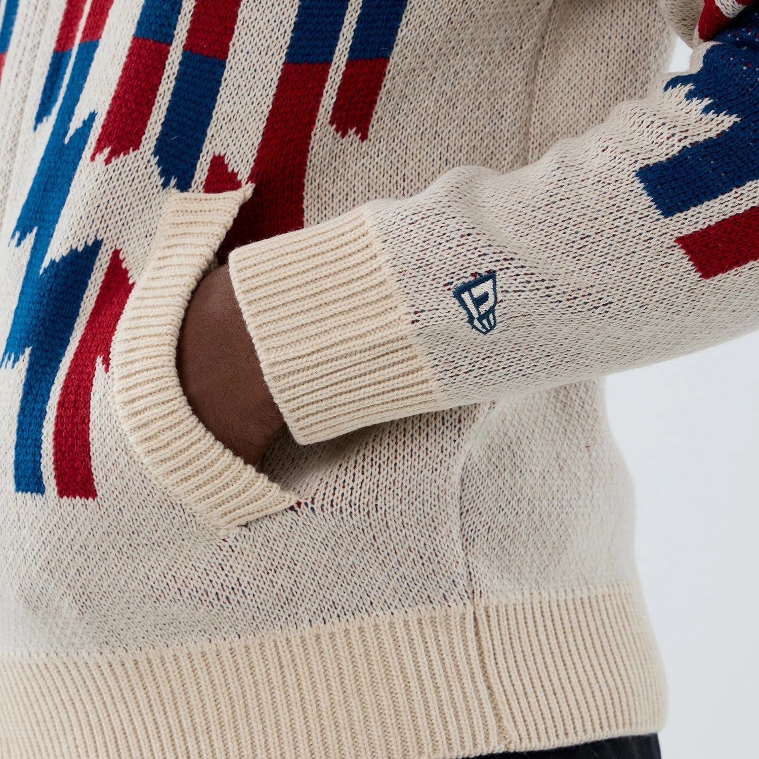 The Male model is wearing  New Era Organic Cowichan Natural Cardigan 4