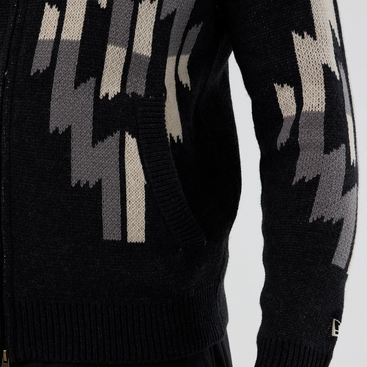 The Male model is wearing  New Era Organic Cowichan Black Cardigan 5
