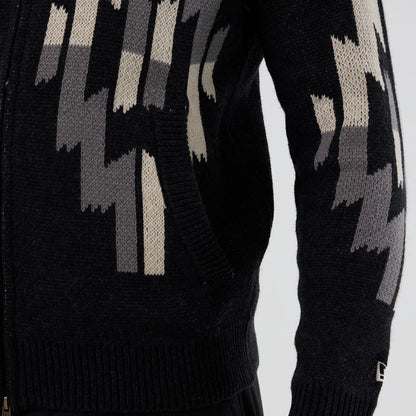 The Male model is wearing  New Era Organic Cowichan Black Cardigan 5