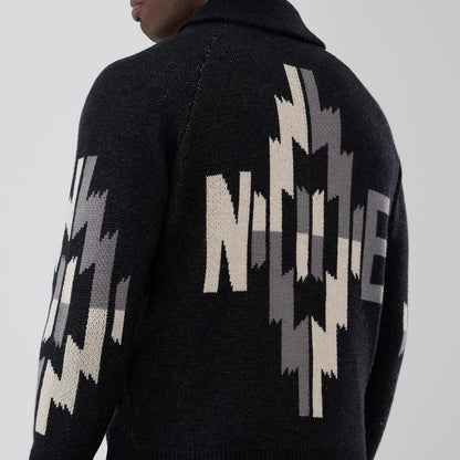 The Male model is wearing  New Era Organic Cowichan Black Cardigan 6