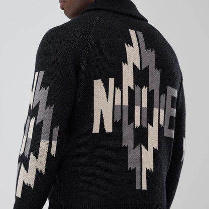 The Male model is wearing  New Era Organic Cowichan Black Cardigan 6