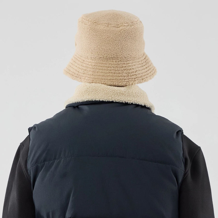 The Male model is wearing  New Era Organic Boa Neck Navy Gilet  8