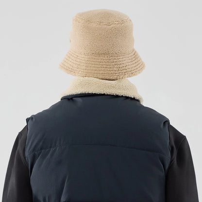 The Male model is wearing  New Era Organic Boa Neck Navy Gilet 8