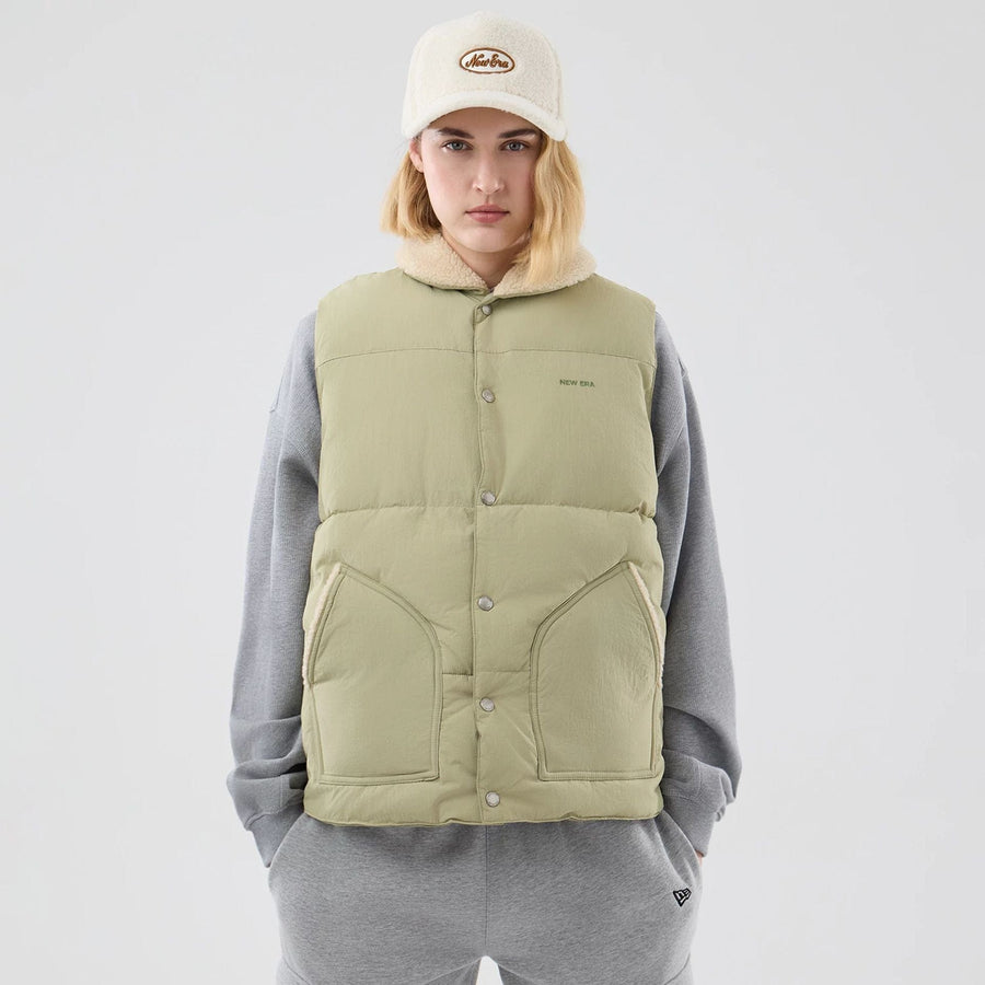 The Male model is wearing  New Era Organic Boa Neck Khaki Gilet  8