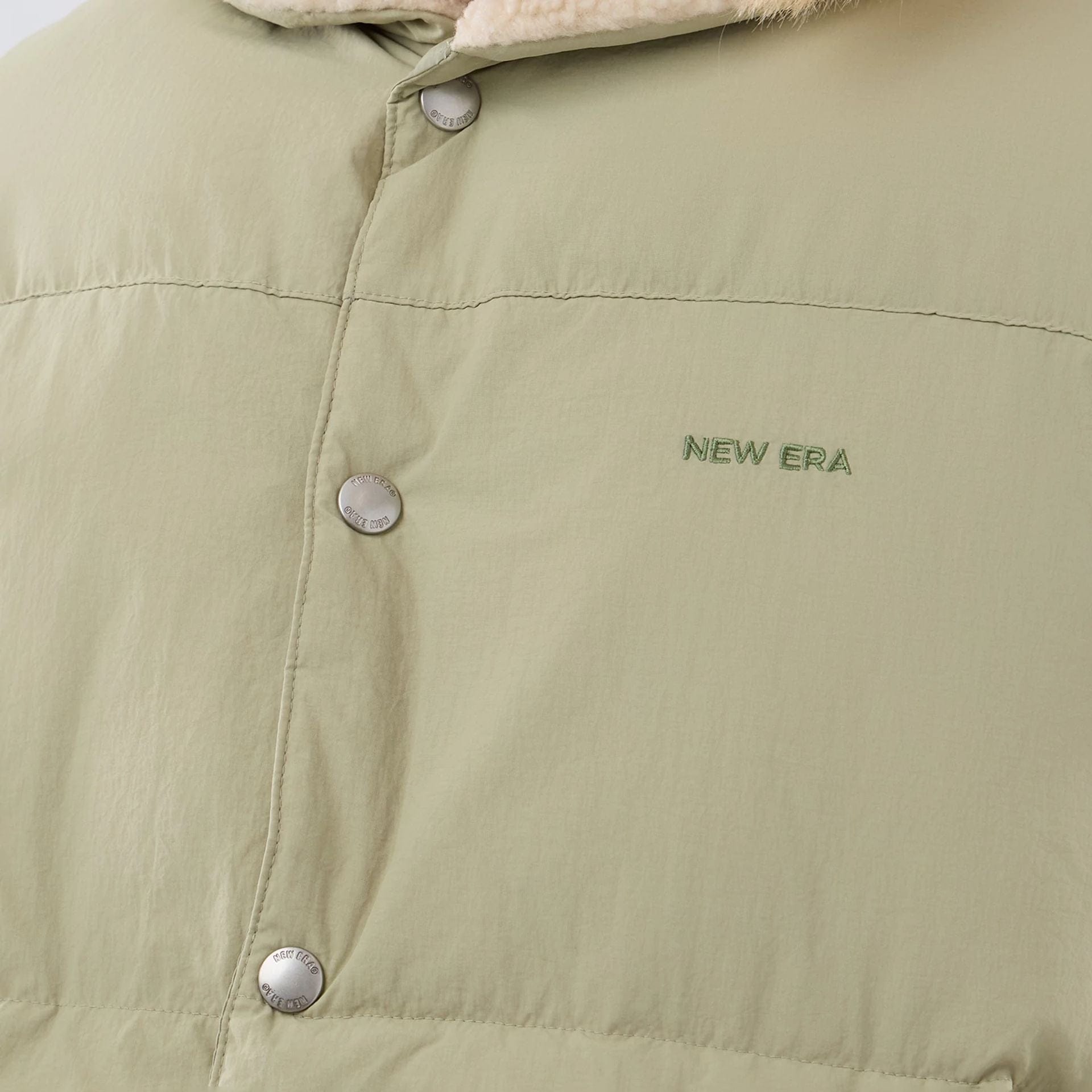 The Male model is wearing  New Era Organic Boa Neck Khaki Gilet  5