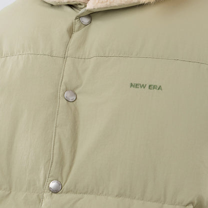The Male model is wearing  New Era Organic Boa Neck Khaki Gilet 5