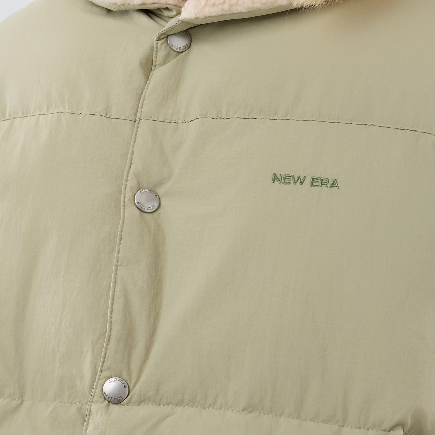The Male model is wearing  New Era Organic Boa Neck Khaki Gilet 5
