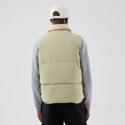 The Male model is wearing  New Era Organic Boa Neck Khaki Gilet  2