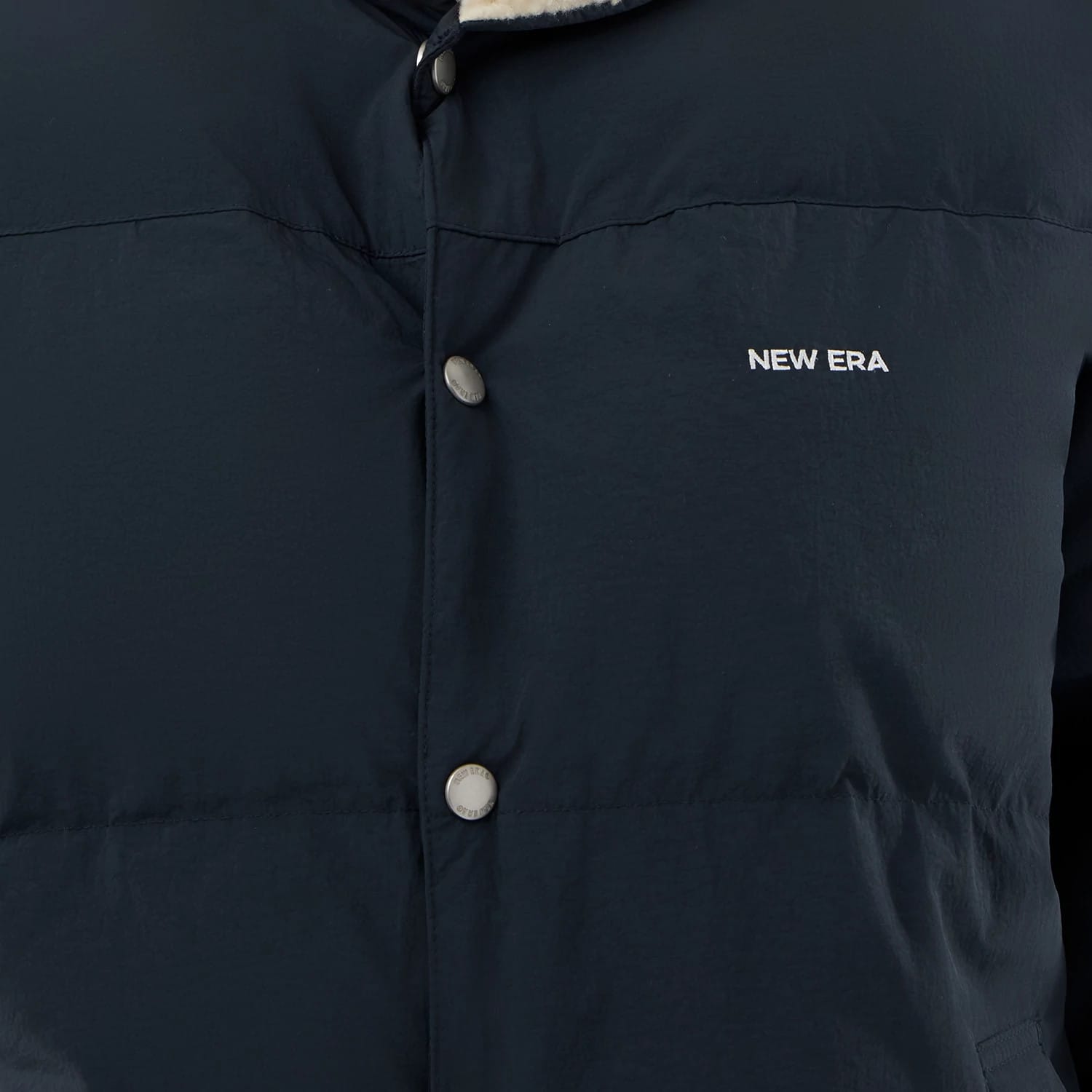The Male model is wearing  New Era Organic Boa Neck Navy Jacket 6