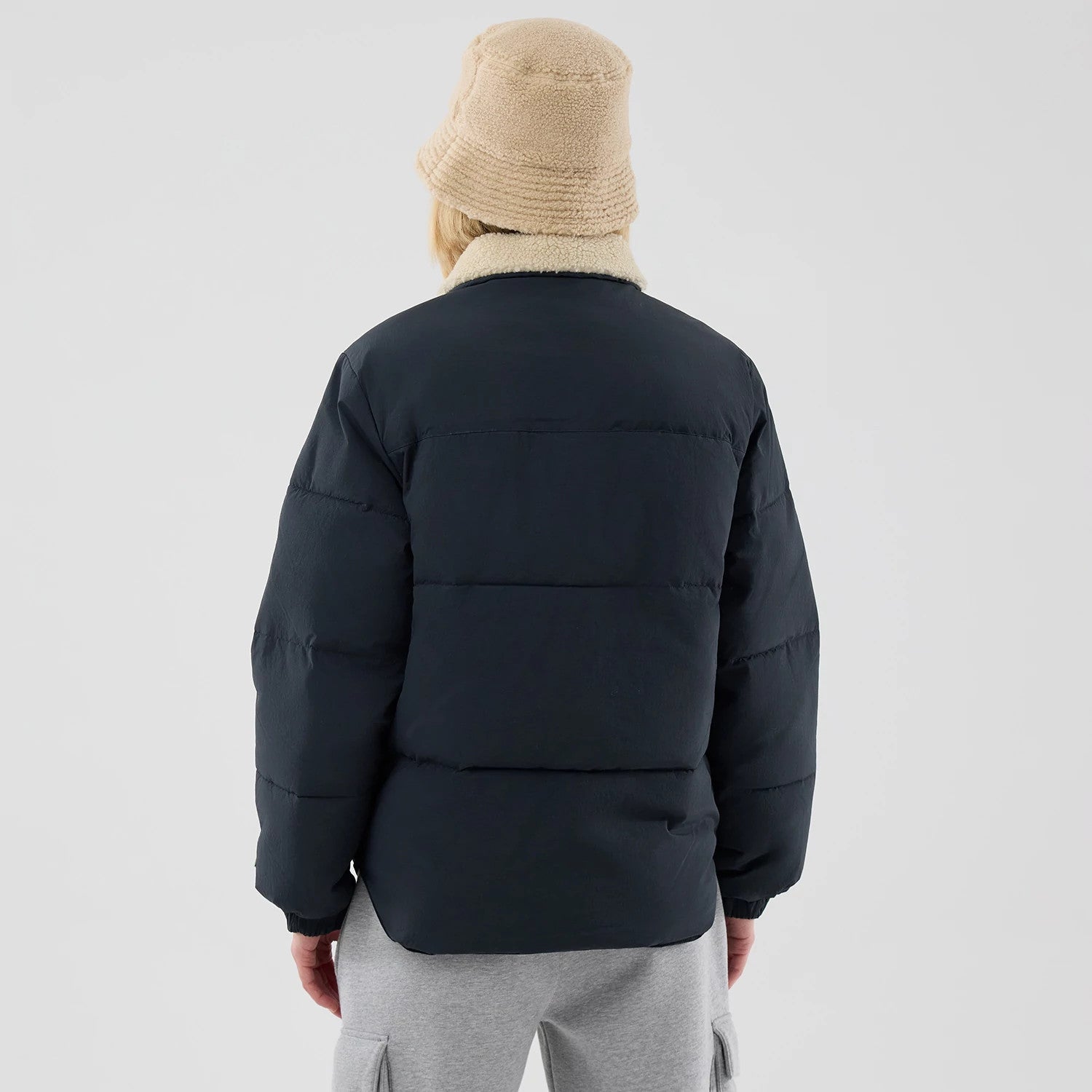 The Male model is wearing  New Era Organic Boa Neck Navy Jacket 2