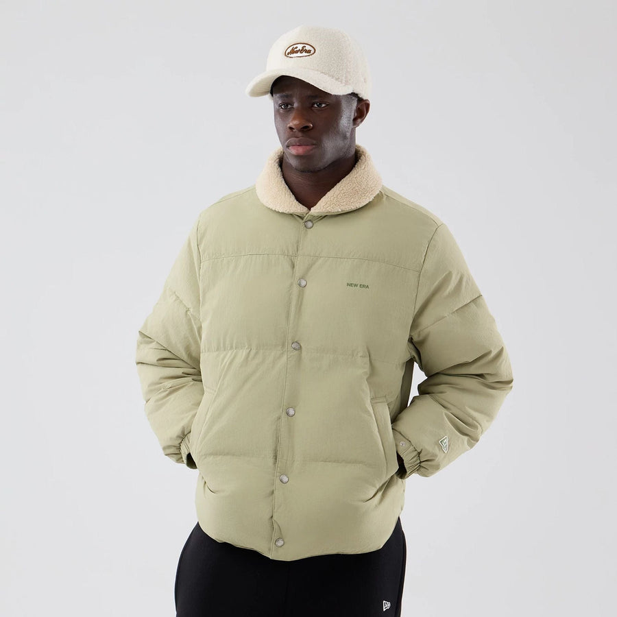 The Male model is wearing  New Era Organic Boa Neck Khaki Jacket  3