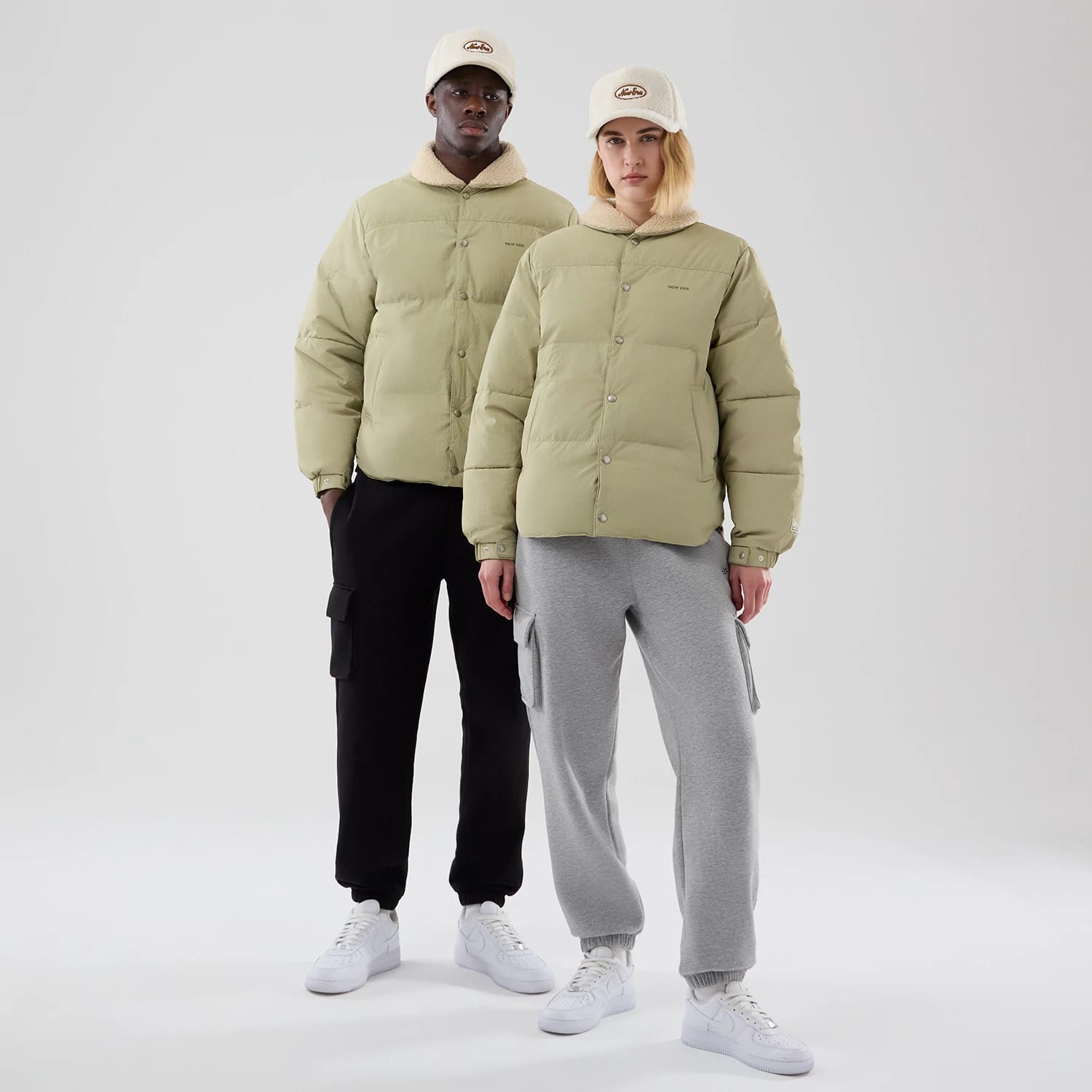 The Male model is wearing  New Era Organic Boa Neck Khaki Jacket 1