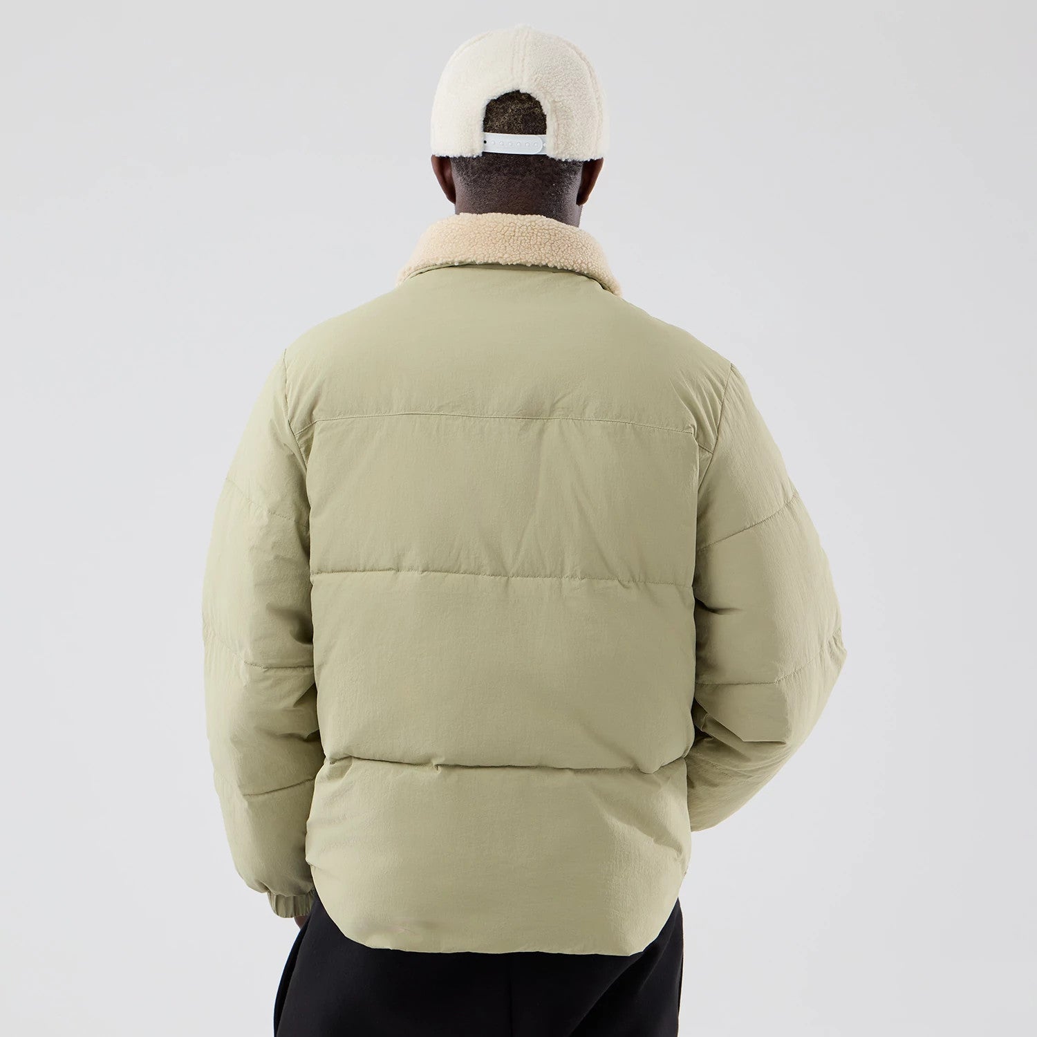 The Male model is wearing  New Era Organic Boa Neck Khaki Jacket 2