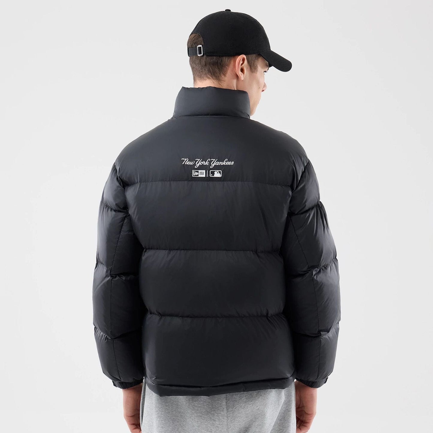 The Male model is wearing New York Yankees MLB Black Puffer Down Jacket  2