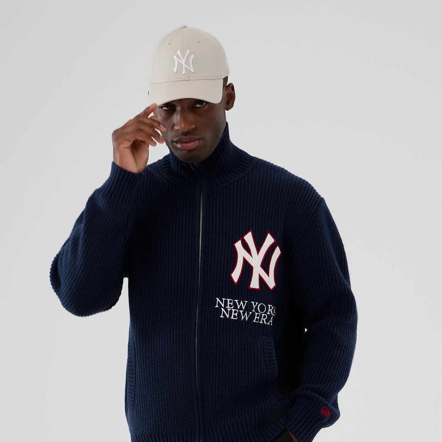 The Male model is wearing New York Yankees MLB Navy Cardigan 6