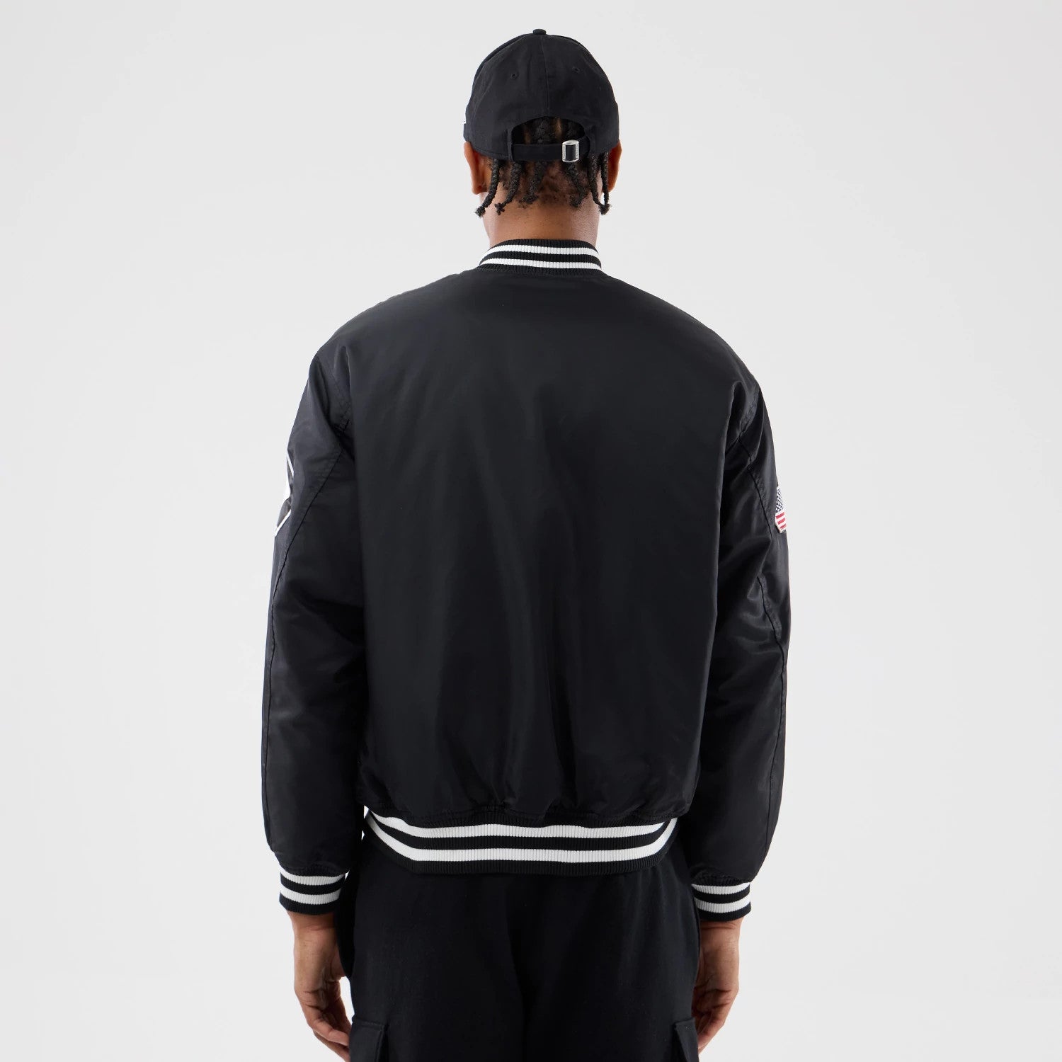 The Male model is wearing Chicago White Sox MLB Authentic Black Stadium Jacket 2