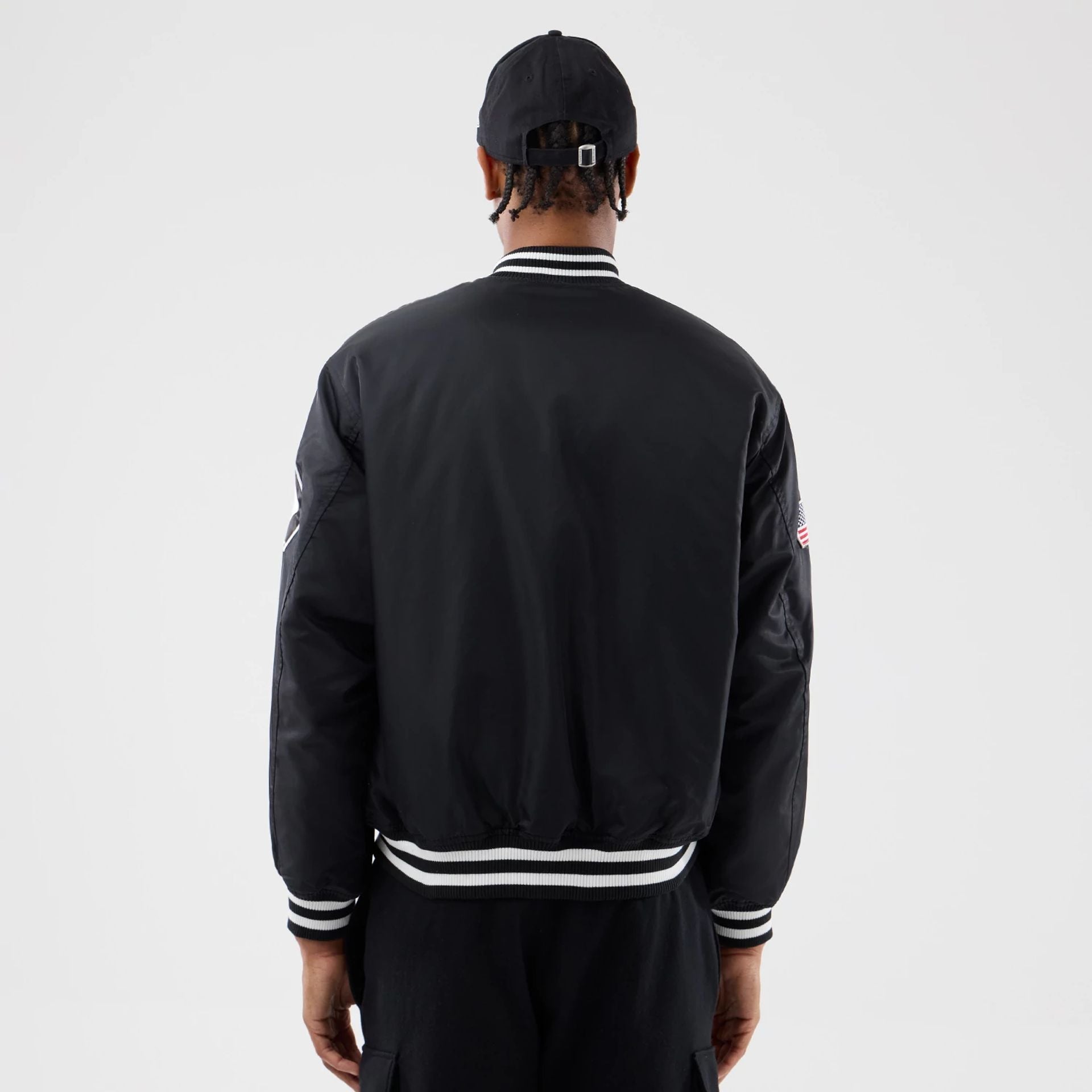 The Male model is wearing Chicago White Sox MLB Authentic Black Stadium Jacket  2