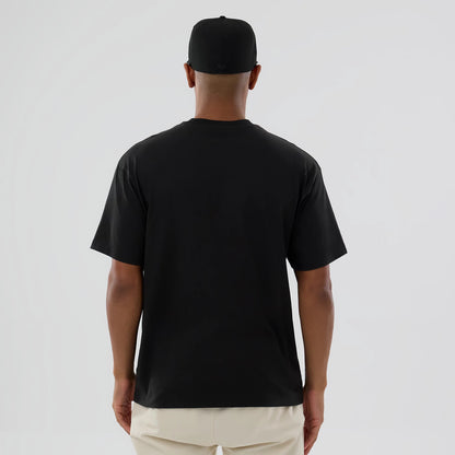 The model is wearing this MLB On Fire LA Dodgers Oversized T-Shirt in black. 2