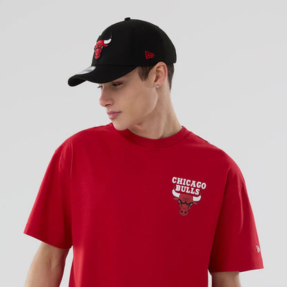 The model is wearing this NBA logo Chicago Bulls T-Shirt in red. 7