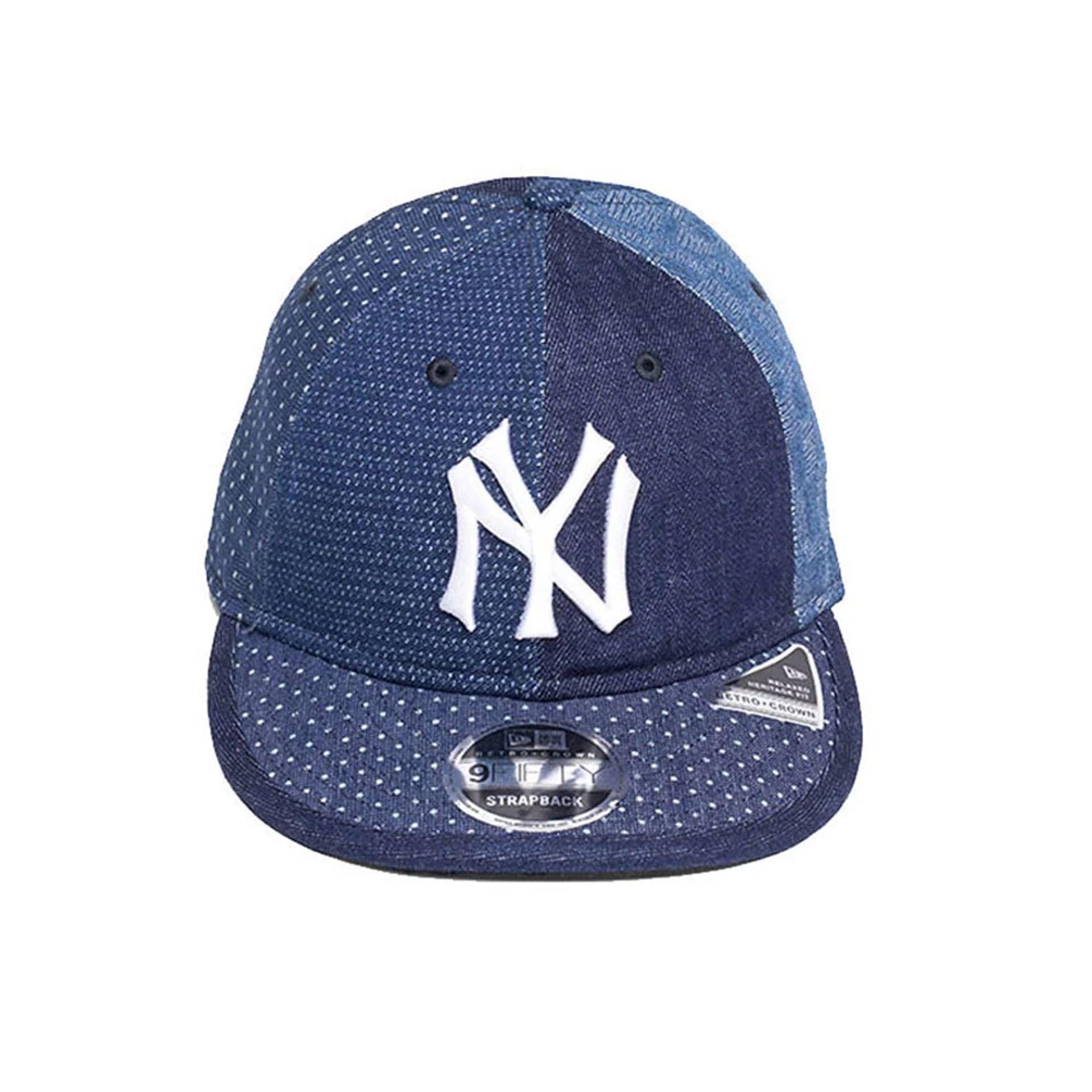 Pictured is this MLB Multi Panel Denim New York Yankees Retro Crown 9FIFTY cap in dark blue. 2