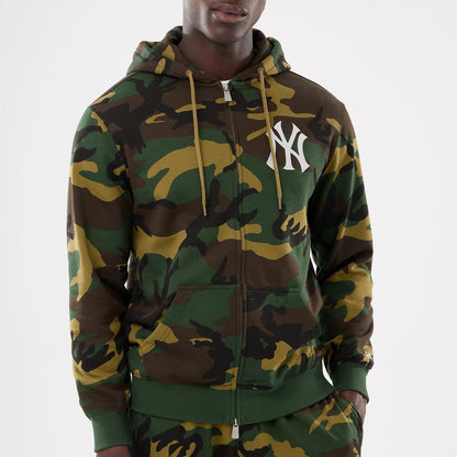 The model is wearing this MLB Camo New York Yankees 2 Way Full Zip Hoodie in Woodland Camo. 4