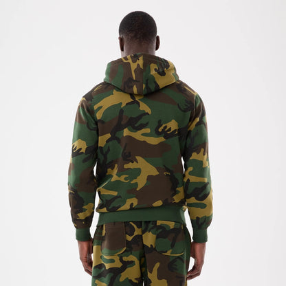 The model is wearing this MLB Camo New York Yankees 2 Way Full Zip Hoodie in Woodland Camo. 2