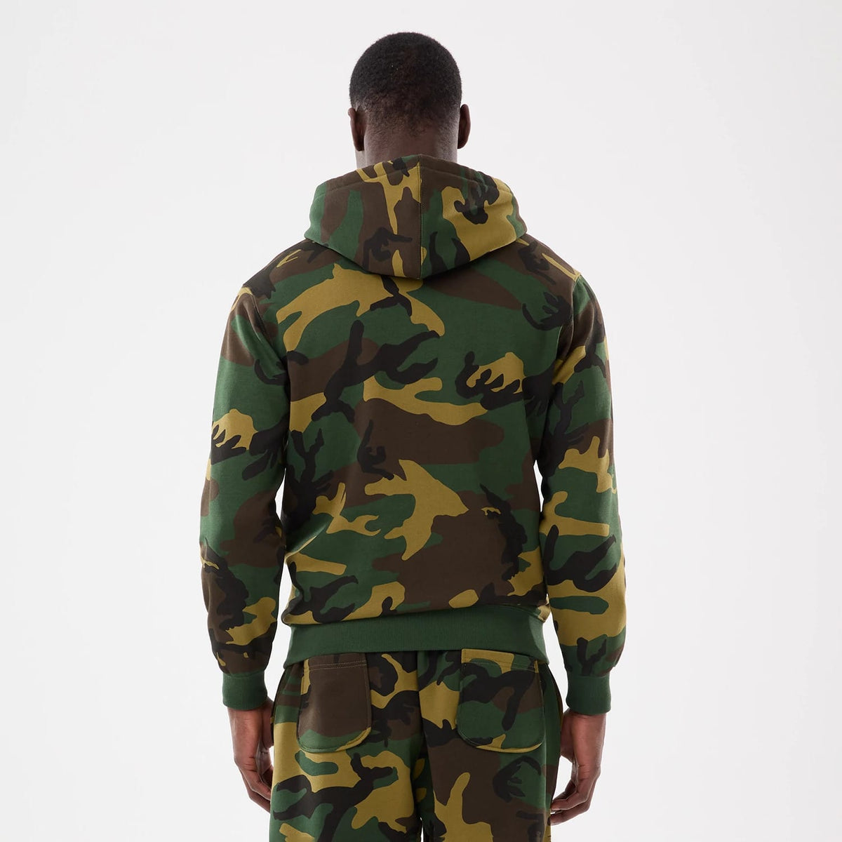 The model is wearing this MLB Camo New York Yankees 2 Way Full Zip Hoodie in Woodland Camo. 2