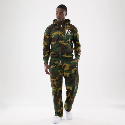 The model is wearing this New Era Woodland Camo Joggers in Woodland Camo. 8
