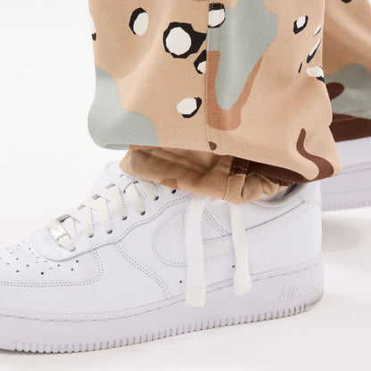 The model is wearing these New Era Desert Camo Joggers. 5
