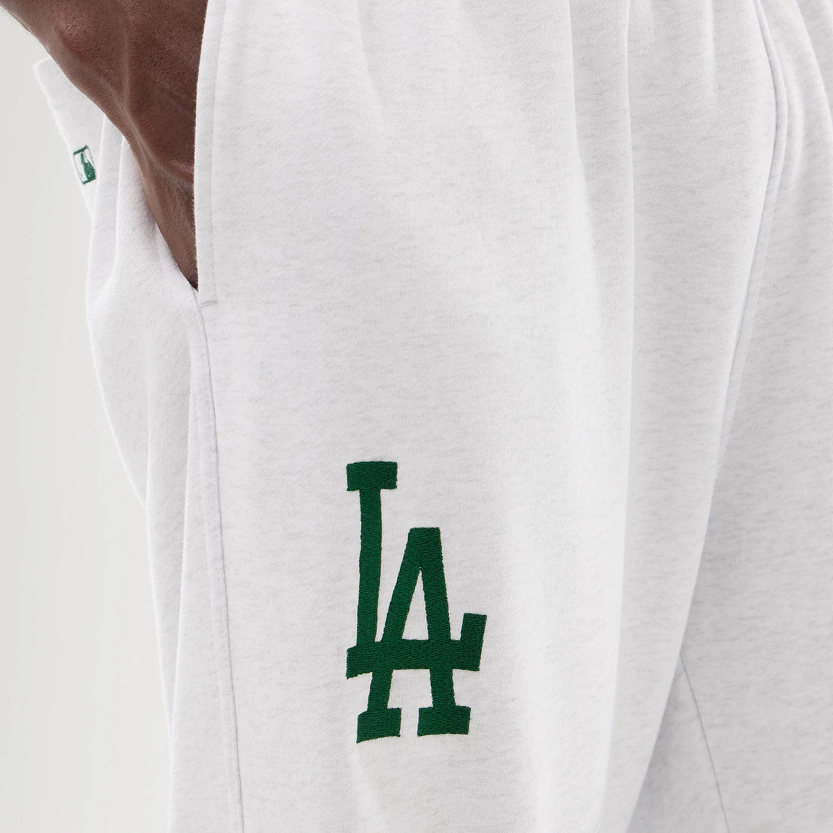 The model is wearing this MLB Comfort LA Dodgers Joggers in grey. 3