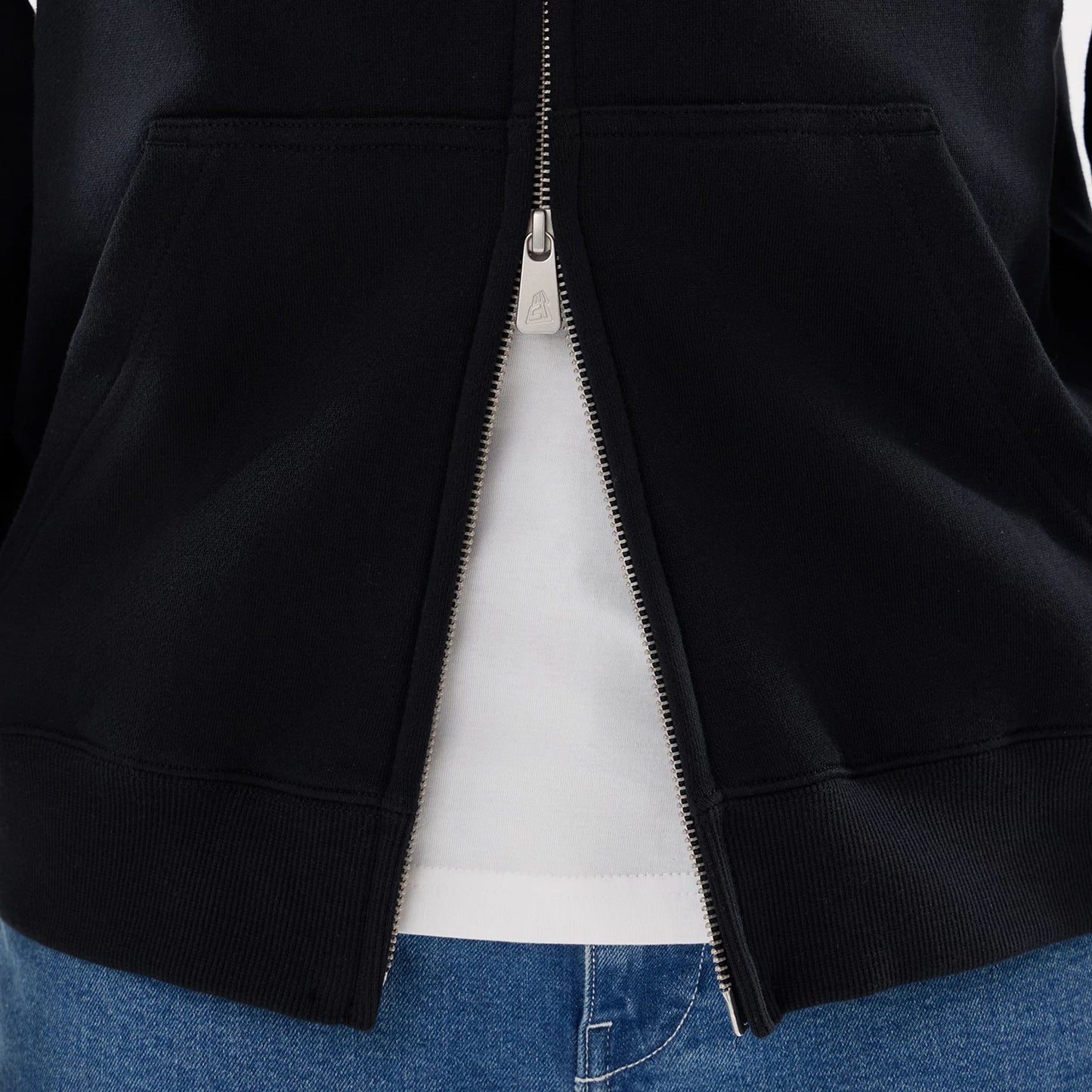 The model is wearing this MLB Word Art New York Yankees 2 Way Full Zip Hoodie in black. 6